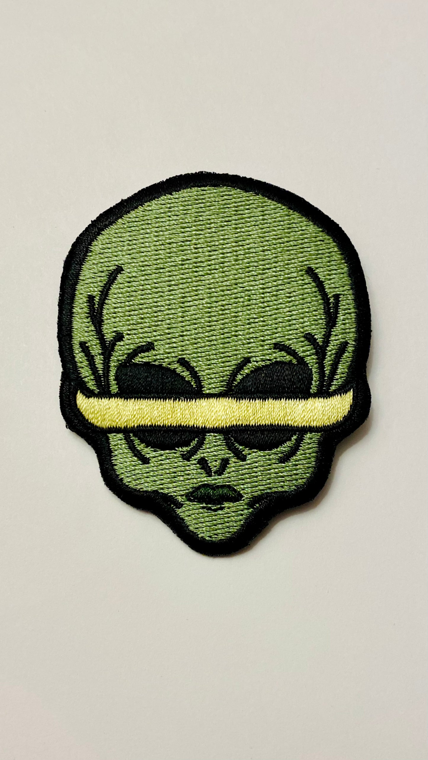 'weird as art' logo patch